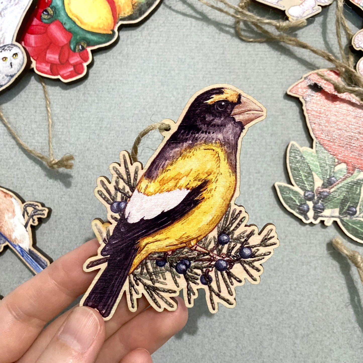 Festive Wooden Animal Ornaments by Lucinda Rowe Art