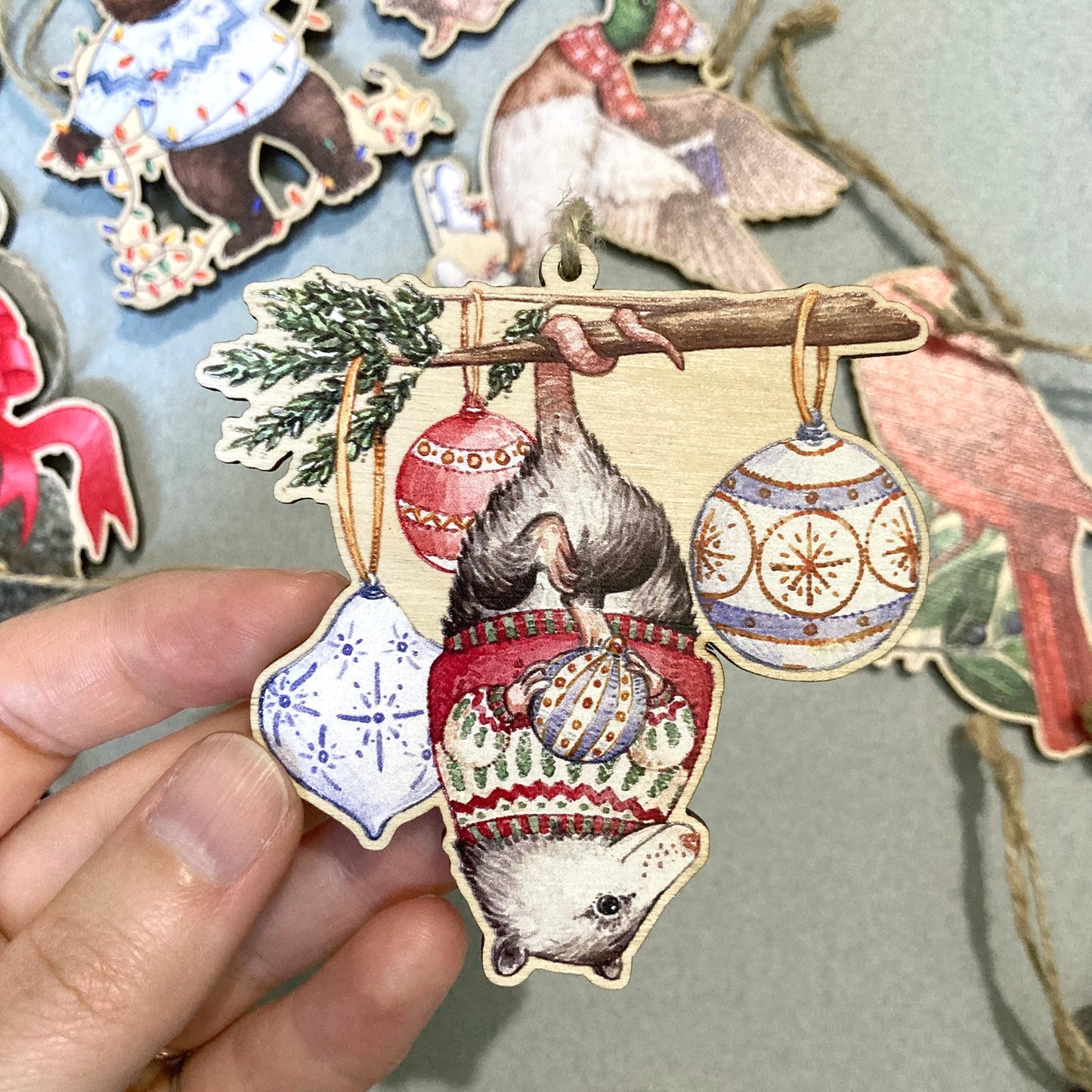 Festive Wooden Animal Ornaments by Lucinda Rowe Art