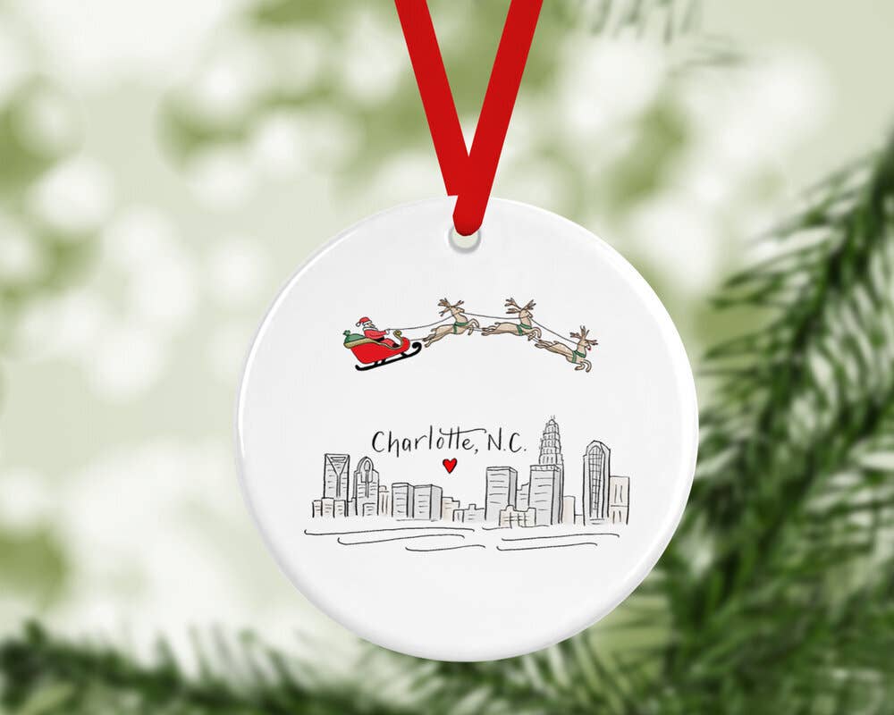 Charlotte Skyline Ornament With Santa And His Reindeer